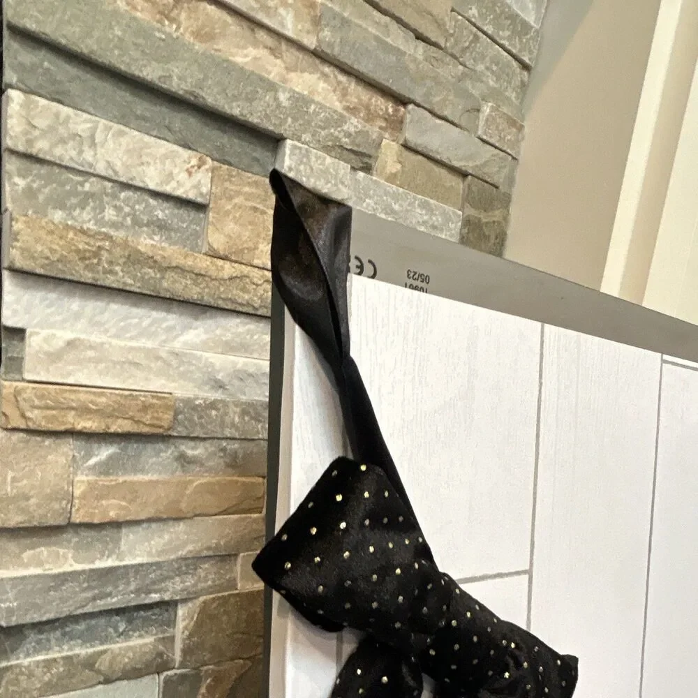 Ashland Velvet Black with Gold Polka Dot Bow Garland Door Decoration, 6 Ft